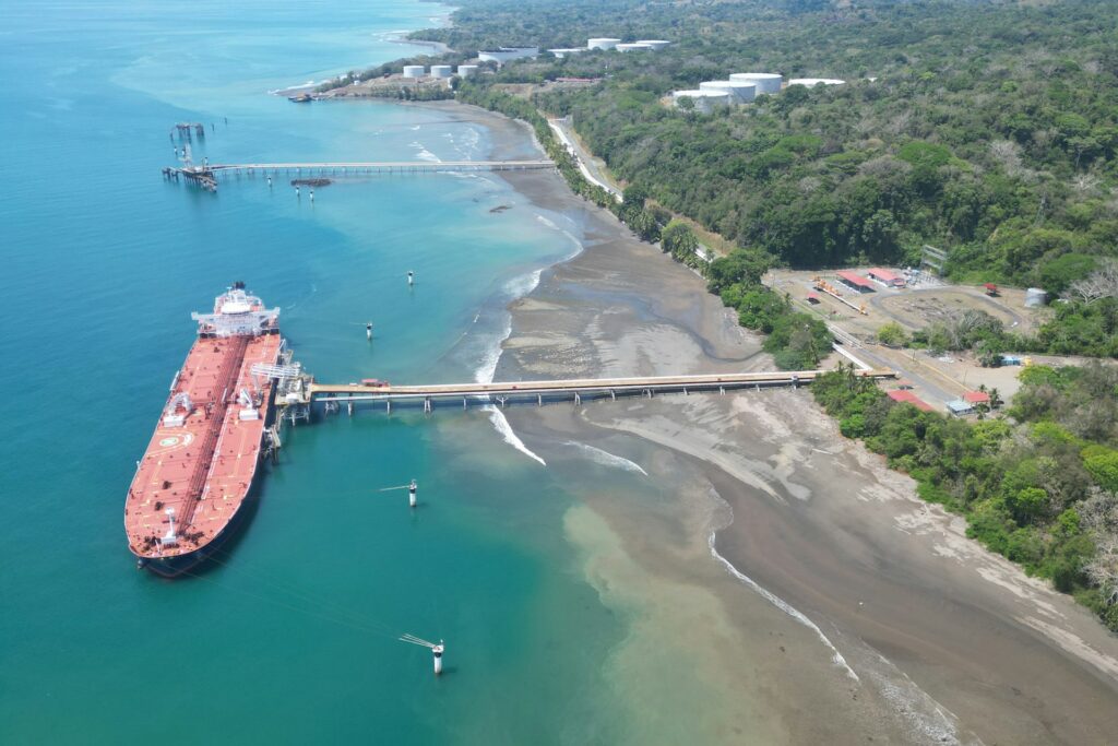 Tanker moored at a jetty terminal, where marine vapour recovery captures loading vapours