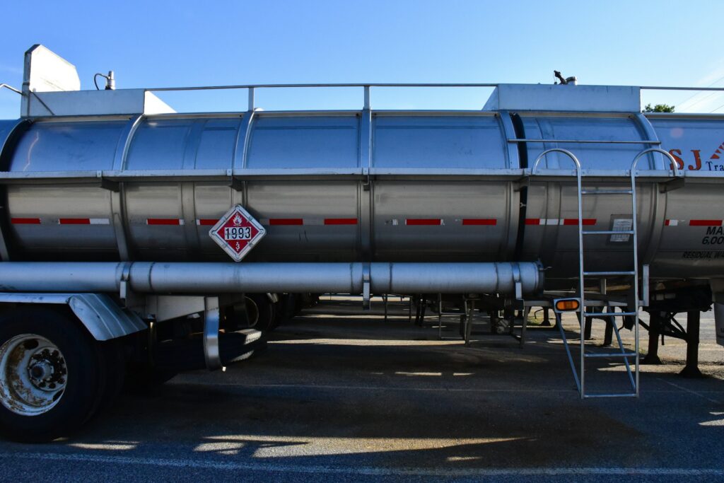 Road fuel tankers with hazard placards, the vehicles served by truck loading vapour recovery